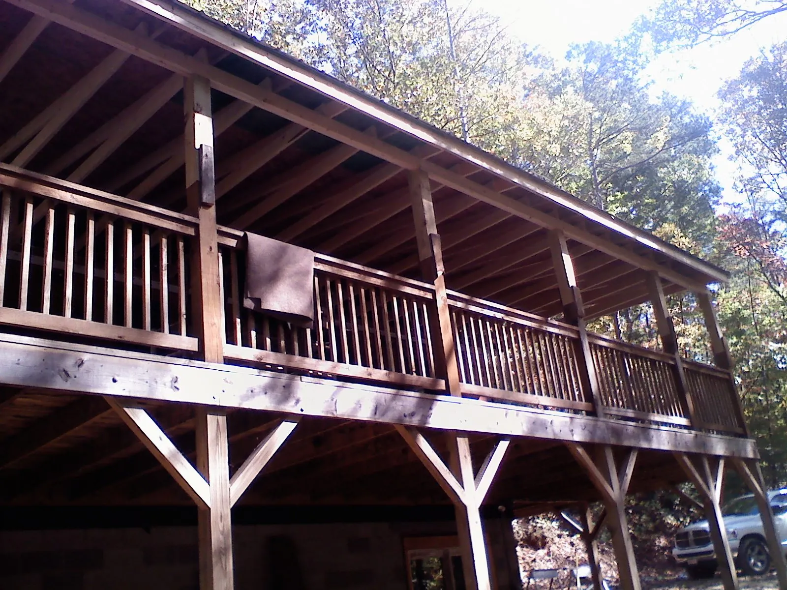 Timber framing under a new elevated porch and deck — Roof Leak Repair in Chinook by Roofing Brothers